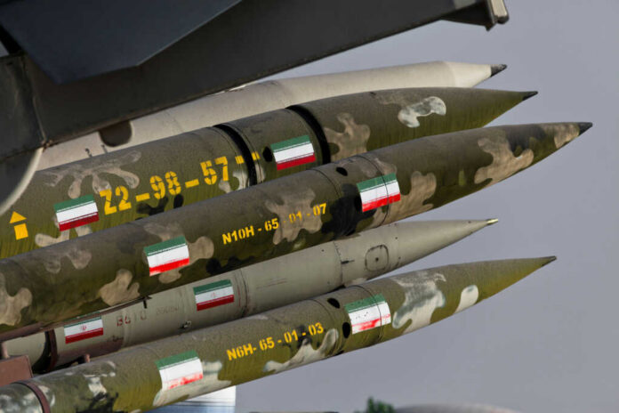 Cluster of camouflaged missiles mounted on a launcher