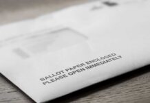 Ballot envelope on a wooden surface