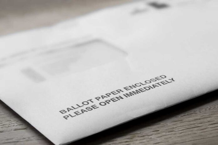 Ballot envelope on a wooden surface