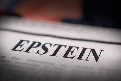 shutterstock_2735966631 Close-up of a newspaper headline reading 'EPSTEIN'