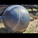 Rocket Debris Sparks Beach Lockdown Strange metal orbs appear on Australian beach