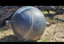 Rocket Debris Sparks Beach Lockdown Strange metal orbs appear on Australian beach