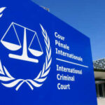 Trump DOJ Rejects Foreign Court’s Authority International Criminal Court sign with scales of justice.