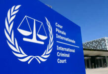 Trump DOJ Rejects Foreign Court’s Authority International Criminal Court sign with scales of justice.