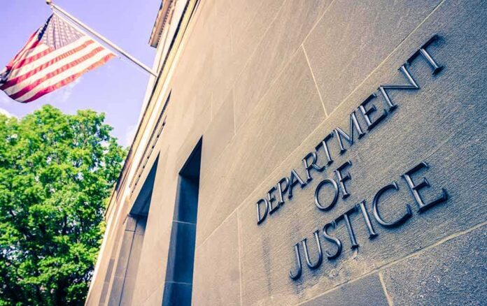 Department of Justice building facade with American flag
