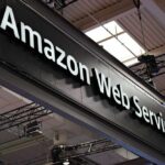 Sign displaying Amazon Web Services at a trade show