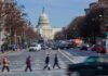 United States Capitol viewed down a busy city street