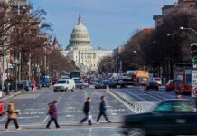 United States Capitol viewed down a busy city street
