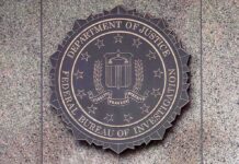 FBI seal mounted on a granite wall