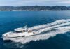 Modern motor yacht cruising on blue sea