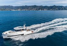 A High-End Takeover Is Raising Security Alarms Modern motor yacht cruising on blue sea