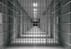 Life Behind Bars Apparently Had Some Perks empty prison corridor with barred cells