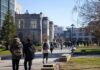 Free Speech Whiplash Hits University students walking on a university campus pathway