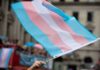 Sorority Showdown Over ‘Woman’ Definition Transgender pride flag waving at a parade