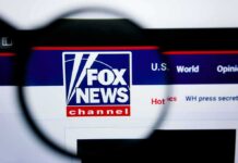 Fox News website logo under magnifying glass