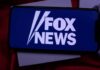 smartphone displaying Fox News logo on screen