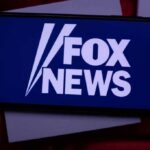 A Serious Accusation Erupts At The Fox Table smartphone displaying Fox News logo on screen