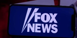 smartphone displaying Fox News logo on screen
