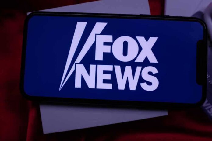 smartphone displaying Fox News logo on screen