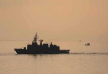 Tehran Just Drew a Much Bigger Battlefield naval ship silhouette at sea during sunset