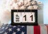 Perpetual desk calendar showing Sep 11 on an American flag