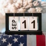 Scripted Tribute? Opponents Smell Spin Perpetual desk calendar showing Sep 11 on an American flag