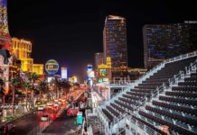 What Happened in Vegas Cost Millions Later Las Vegas Strip at night with traffic and grandstand seating