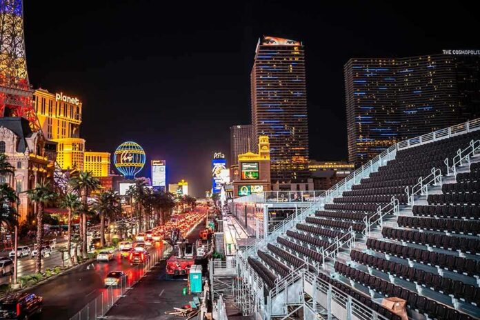 shutterstock_2378191383 Las Vegas Strip at night with traffic and grandstand seating