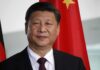 Trade Truce Twist – Leverage Reloads In January Xi Jinping portrait with flags in the background