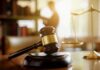 Memoir Backfires – Tupac Murder Conviction Judge's gavel on a desk with scales of justice in background