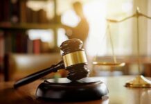 Memoir Backfires – Tupac Murder Conviction Judge's gavel on a desk with scales of justice in background