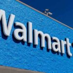 Walmart storefront sign on bright blue exterior wall