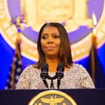 Woman speaking at podium with microphones
