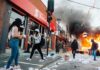 Looters Swarm Paris – Streets ‘Devastated’ Street protest with fire and smoke outside a bank