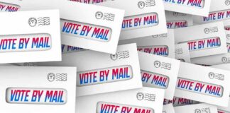 Envelopes with vote by mail windows stacked in a collage