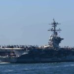 Patriot Moves Signal Hot Weekend Aircraft carrier cruising at sea