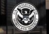U.S. Department of Homeland Security seal on a building plaque