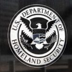 U.S. Department of Homeland Security seal on a building plaque