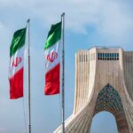 Shock Visit: Riyadh Walks Into Tehran Iranian flags beside Azadi Tower in Tehran