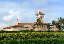Power Crowd Packs Mar-a-Lago Rehearsal Mediterranean-style seaside mansion with tower and palm trees