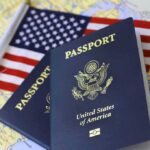 U.S. passports on a map with an American flag